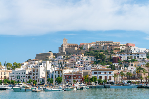 22th June 2019 - Ibiza, Spain.  Scenic Eivissa Old Town Dalt Vila with the cathedral of Santa Maria d'Eivissa built on the top. The marina view and old whitewashed buildings.