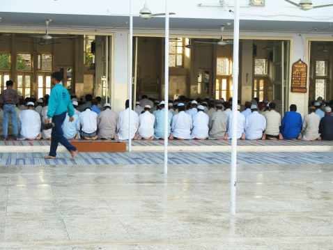 Depok, Indonesia - May 22, 2023 : people praying in the mosque