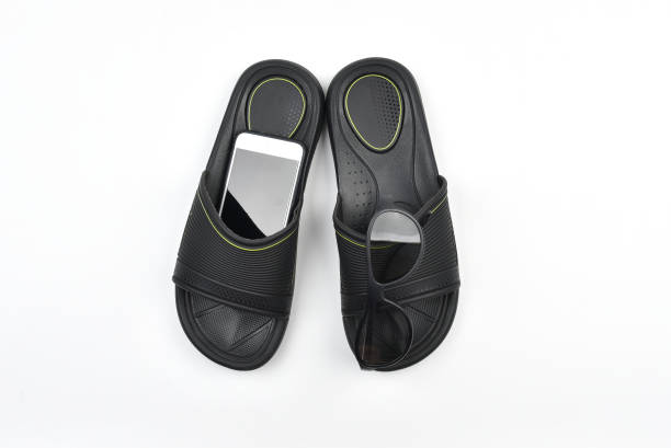 istock Sunglasses, slippers, smartphone isolated on white background 1158856180