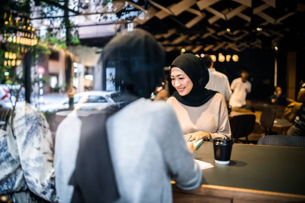 Malaysian girls in a cafe.