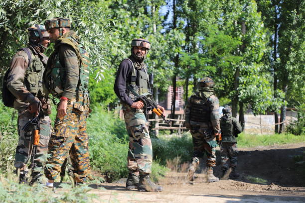 Encounter between militants and Security forces in Kashmir A fierce Gun-Battle erupted between Militants and Indian Security forces at Gund Checkpora of Budgam in Central of Kashmir, One JEM militant was Killed when a Gun-Battle between militants and Government forces broke early morning in Budgam Village south of Kashmir. Police said. militant groups stock pictures, royalty-free photos & images