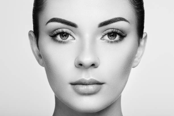 istock Beautiful woman with long false eyelashes 1158859720