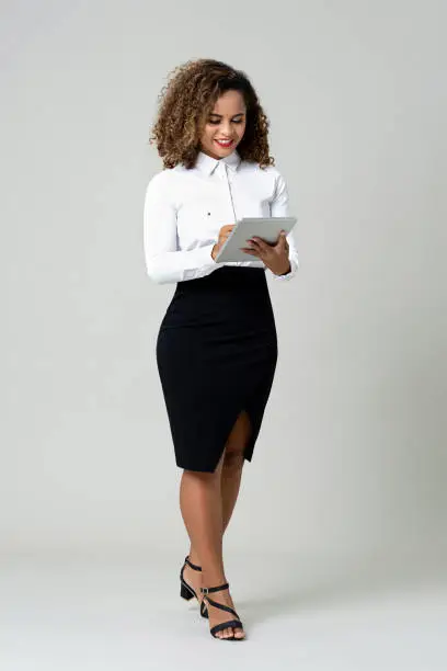 Photo of Business woman using tablet computer