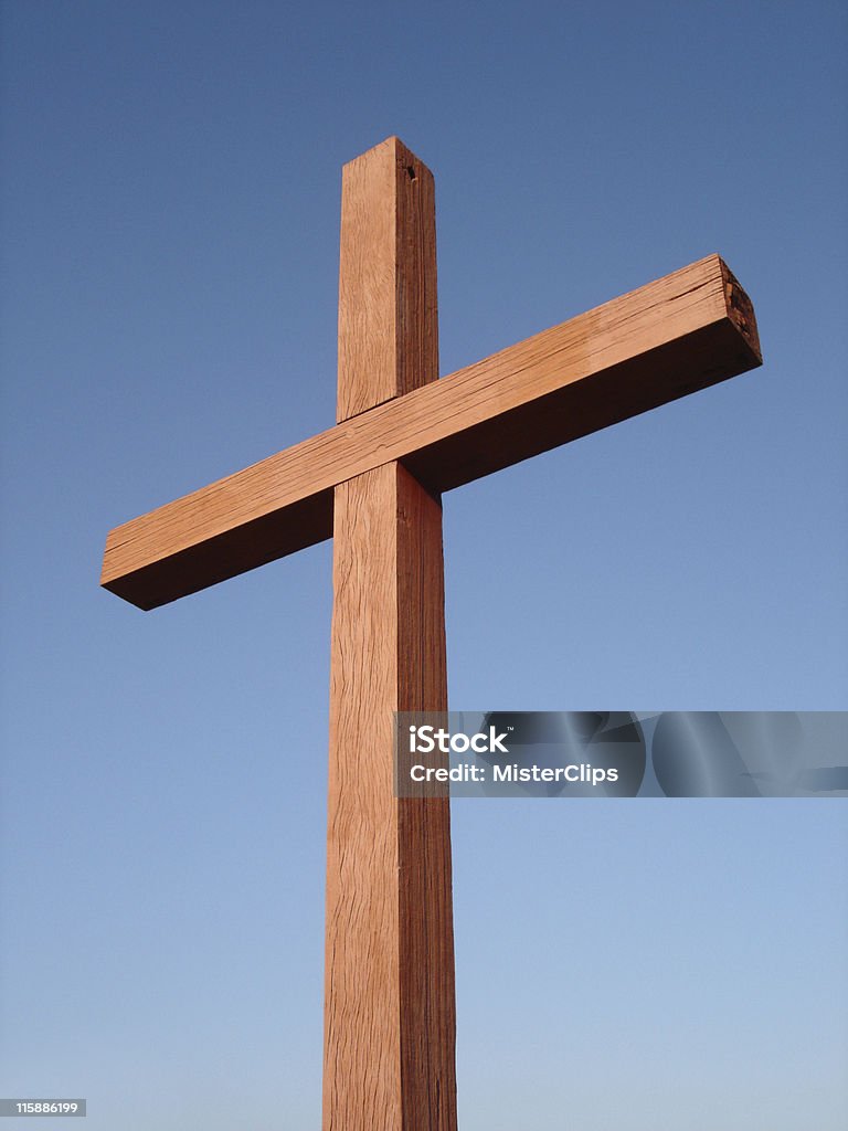 Wooden Cross in Sun Portrait  Catholicism Stock Photo
