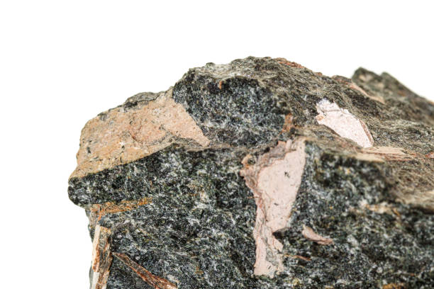 istock Macro stone mineral Diopside Calcite Magnetite on a white background 1158862512