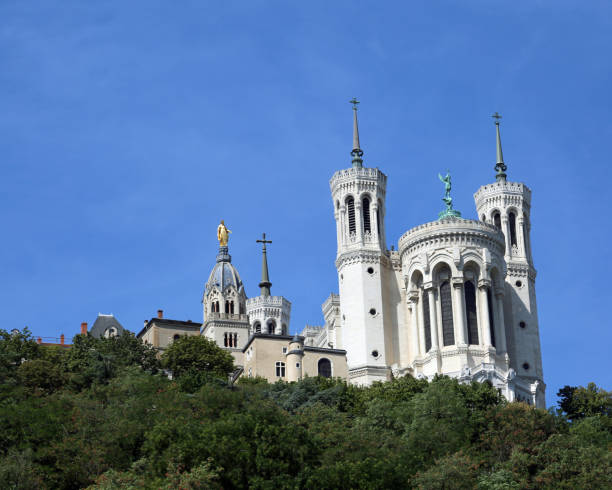 istock white basilica called notre dame de fourviere with bell towers L 1158865038