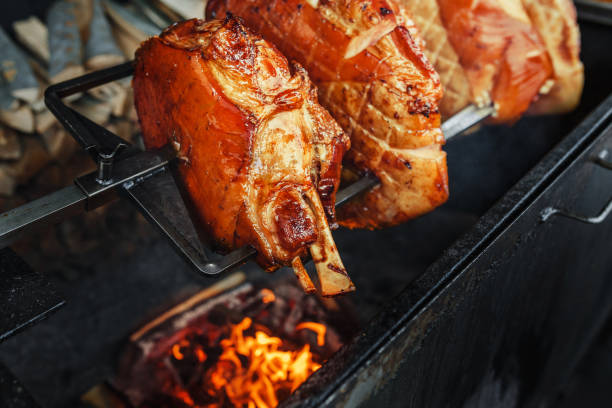 istock Large chunks of pork cooked on open flame 1158872650