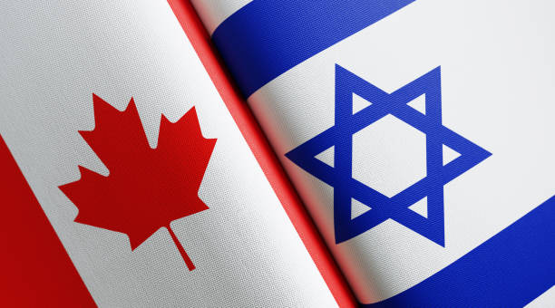 istock Canadian And Israeli Flag Pair 1158873576