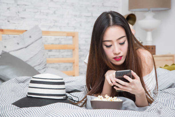 istock Young Asian girl working at home 1158873934