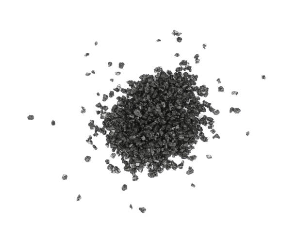 istock Close up black Hawaiian salt isolated on white 1158874830