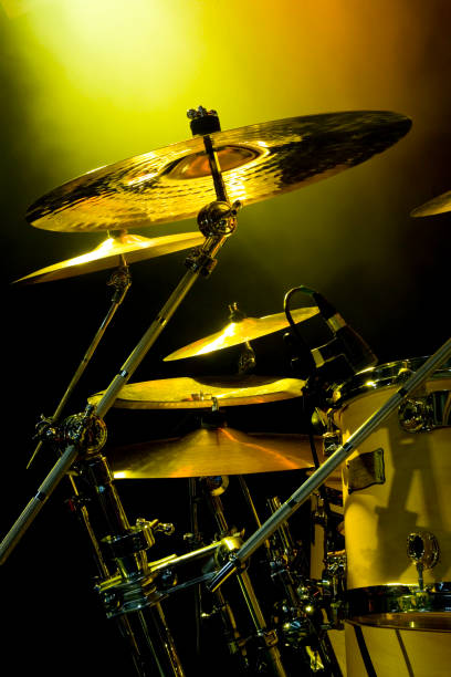 istock Cymbals with rock gig lighting 115888132