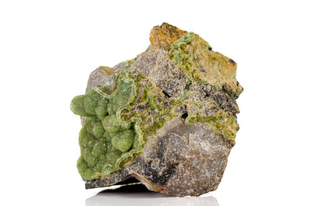istock Macro pink Smithsonite mineral stone on microcline on white background 1158881758