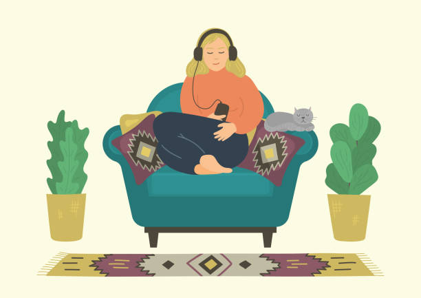 Woman relaxing and listening podcasts, online training, music, or online radio. Woman relaxing and listening podcasts, online training, music, or online radio. Women sitting in armchair with cat. Vector illustration. podcasting illustrations stock illustrations