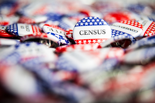 Closeup of button with text that says Census