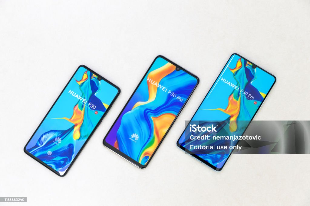 Huawei P30, P30 Pro and P30 Lite mobile smartphones Belgrade, Serbia - Jun 27, 2019: Three new Huawei P30, P30 Lite and P30 Pro cellphones are displayed on isolated white background. Huawei Stock Photo