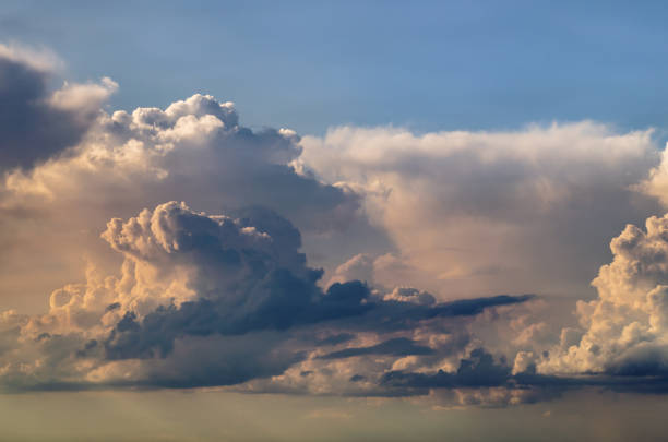 Beautiful stormy cumulus clouds in the sky, background