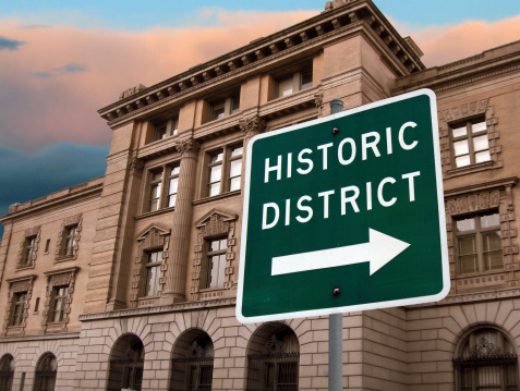 A sign that says Historic District in front of an old customs house in Portland, Oregon.