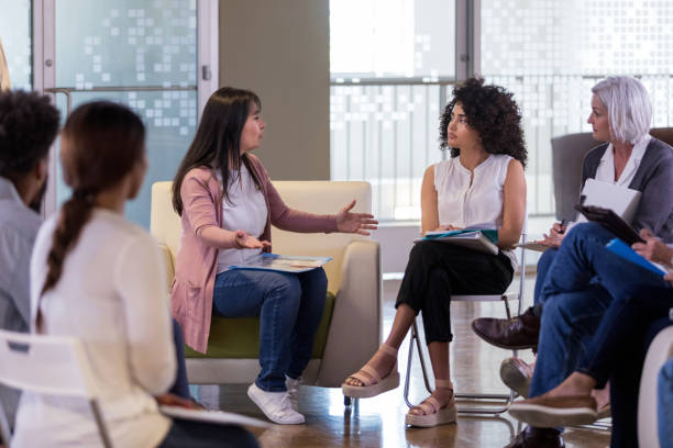 istock Homeowners association members disagree during monthly meeting 1158889501