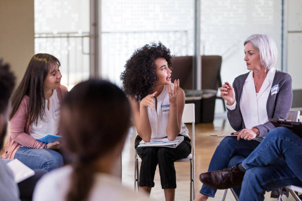 istock Female team members seriously discuss the proposed budget 1158889507