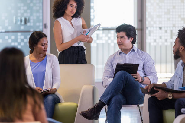 istock Native American business manager addresses employee concerns 1158889593