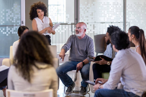 istock Caucasian association president makes strong point in meeting 1158889600