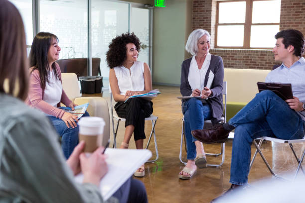 istock Diverse group pays attention to business manager 1158889650