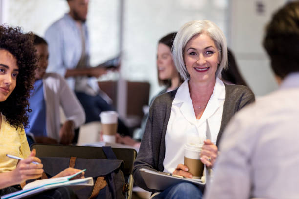 istock Manager and assistant interview prospective employee at coffee shop 1158889674