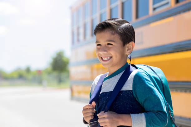 istock Excited young schoolboy 1158889815