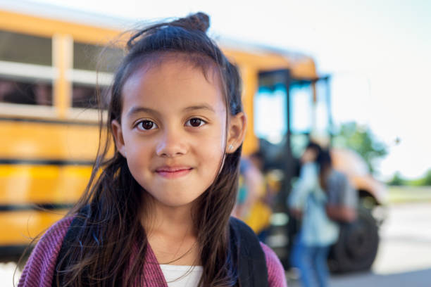 istock Adorable elementary schoolgirl 1158889837
