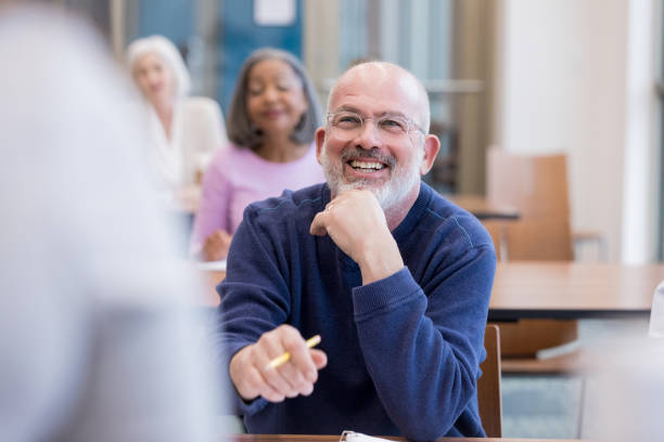 istock Cheerful mature male college student 1158890063
