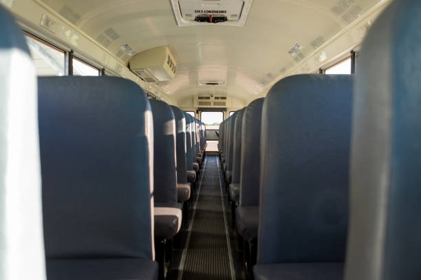 istock Rows of empty seats in clean bus 1158890064