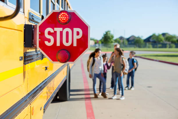 istock Children feel safe with bus warning sign out and flashing 1158890071