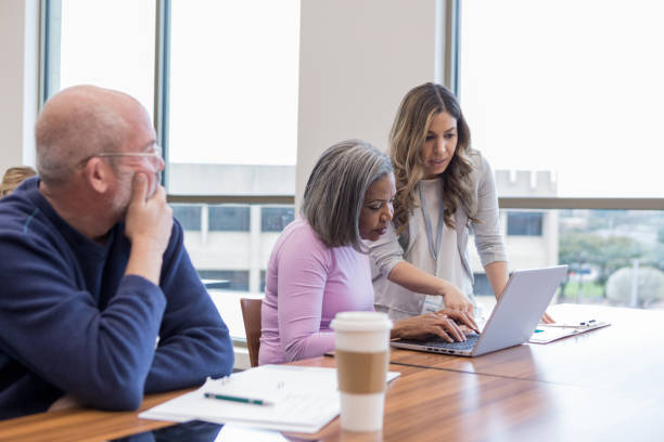 istock Team of businesspeople working together 1158890137