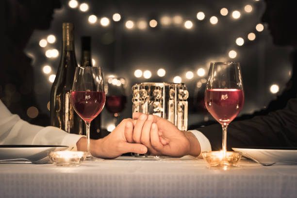 date night - restaurant wine table table for two imagens e fotografias de stock