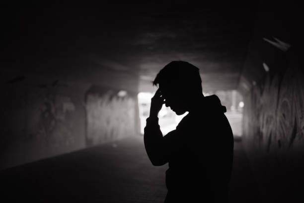 istock Sad man in the tunnel 1158891197