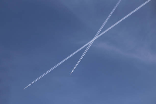 istock Airplanes leave traces in the sky 1158895290