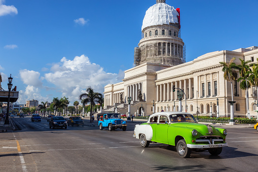 Havana, Cuba - May 13, 2019: Classic Old Car in the streets of the Old Havana City during a vibrant and bright sunny morning.