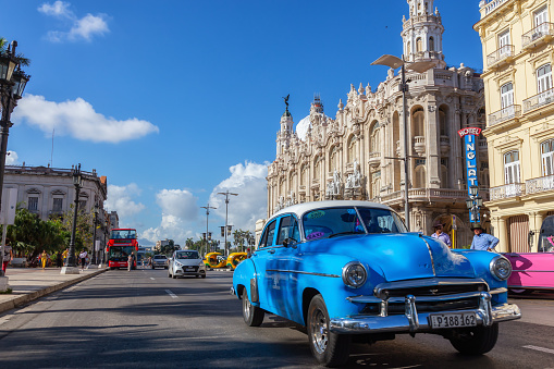 Havana, Cuba - May 13, 2019: Classic Old Car in the streets of the Old Havana City during a vibrant and bright sunny morning.