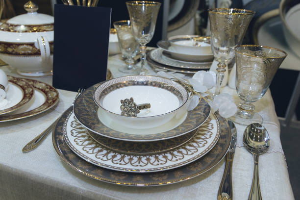 Plates and glasses on the table. Luxurious serving