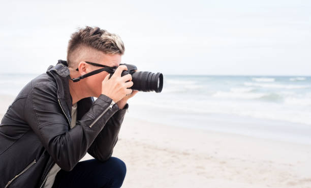 istock Capturing the sea in her camera 1158904767