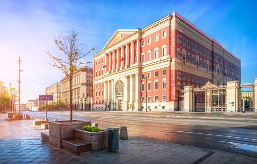 City Hall building on Tverskaya Street in Moscow in the early morning sunny hour. Inscription: Tverskaya street, 13