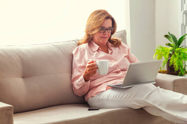 istock Business woman relaxing at home. 1158905966