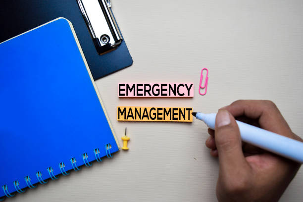 Emergency Management text on sticky notes with office desk concept Emergency Management text on sticky notes with office desk concept emergency response workplace stock pictures, royalty-free photos & images