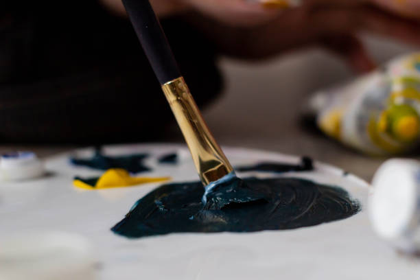 istock close up painting brushes in the art studio 1158907856