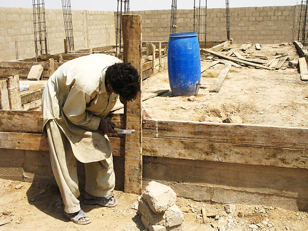 Home construction Concrete base structure of Asian house under construction. basement construction site construction blueprint stock pictures, royalty-free photos & images