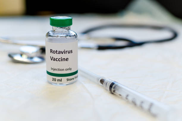 Rotavirus vaccine vial Fake rotavirus vaccine vial with syringe and stethoscope at the background polio photos stock pictures, royalty-free photos & images