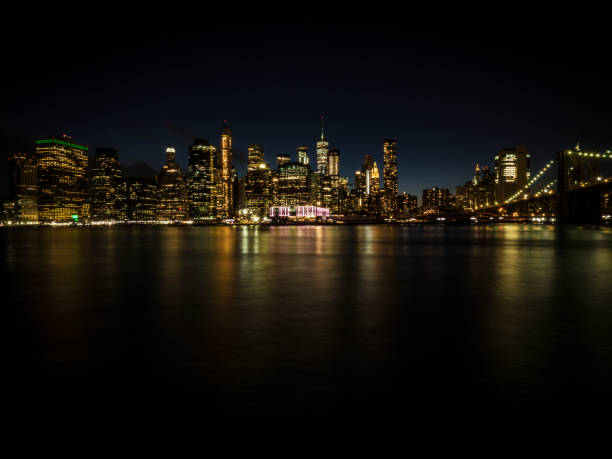 istock Brooklyn Bridge And Manhattan Skyline In Night 1158912478