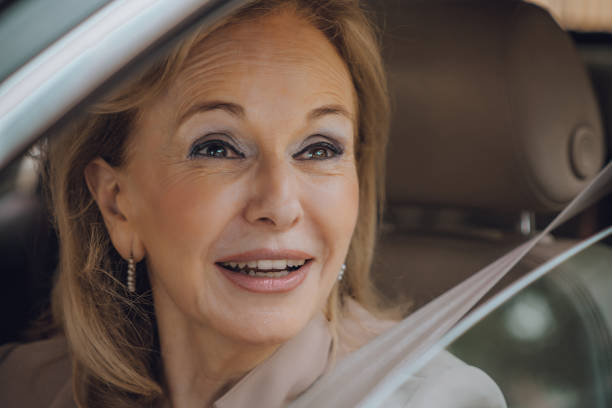 istock Senior female driving 1158913368