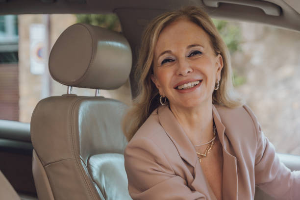 istock Senior female driving 1158913381