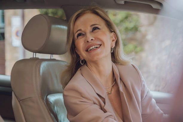 istock Senior female driving 1158913410